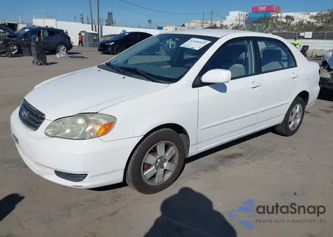2003 Toyota Corolla Le z USA, uszkodzony, nr VIN JTDBR32E630013221